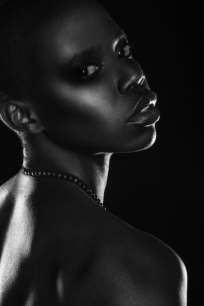 Black African young sexy fashion model studio portrait isolated - Fotó, kép