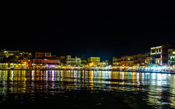 Beautiful and colorful port of Chania city - Crete, Greece - night shot - 写真・画像