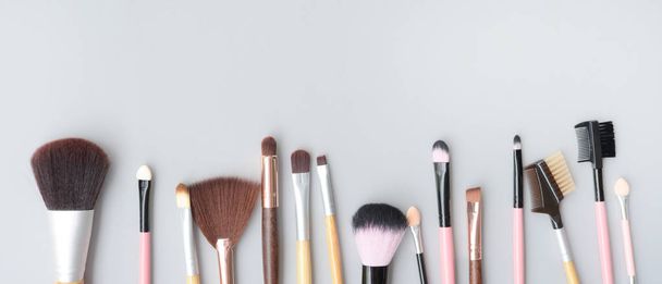 Set of makeup brushes for background - Foto, afbeelding