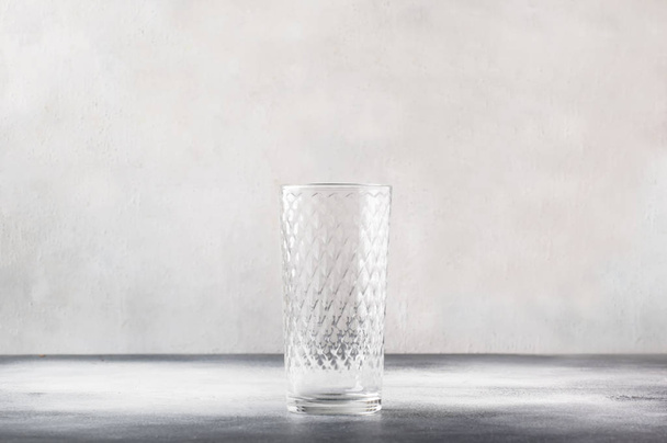 Empty glasses for water, soda or cocktail, copy space, selective focus - 写真・画像