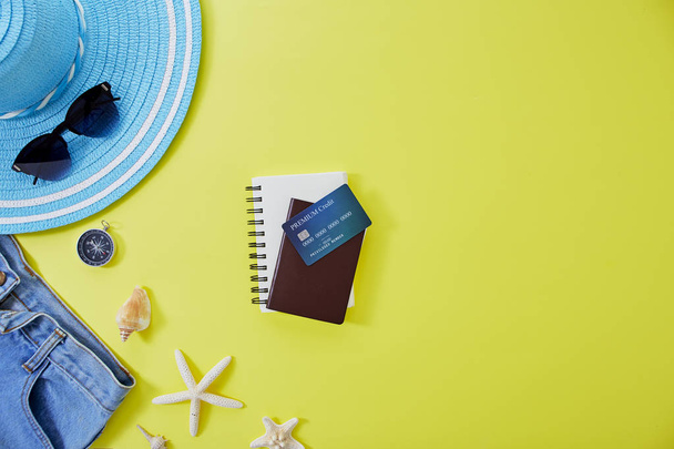 Flat lay yellow summer travel concept background - Photo, Image