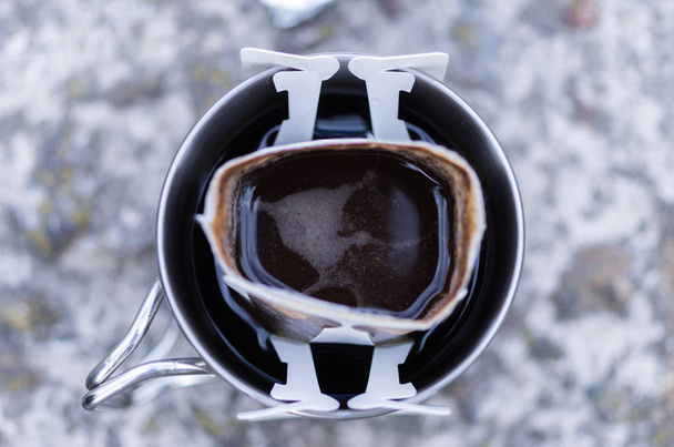A cup of black coffee. View from above. - Photo, Image
