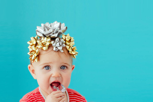 Baby decorated with a bow - Zdjęcie, obraz
