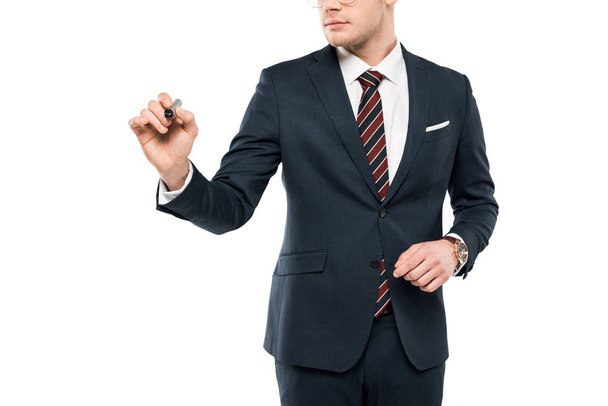 cropped view of businessman holding marker pen isolated on white  - Foto, afbeelding
