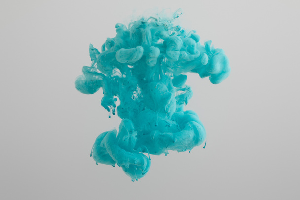 blue paint splash isolated on grey - Fotó, kép
