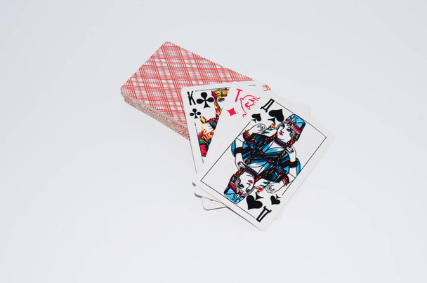 Deck of playing cards on white background - Fotoğraf, Görsel