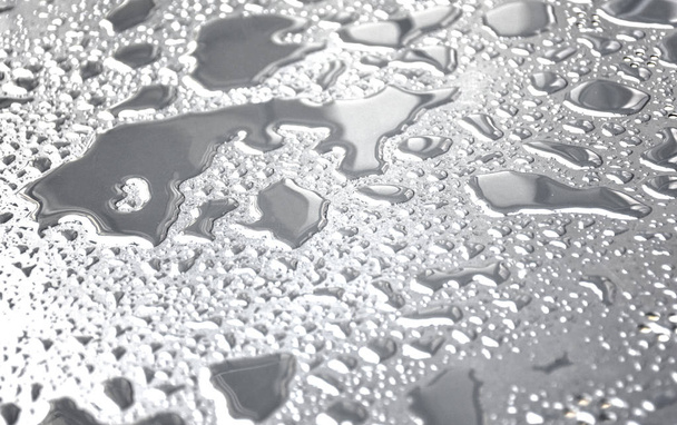Крупные капли воды на металлической поверхности могут быть использованы для веб-дизайна
 - Фото, изображение