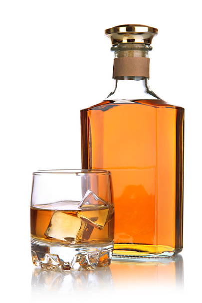Glass of brandy and bottle isolated on white - Foto, Imagem