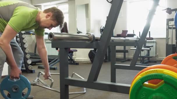 The man in the gym. Fitness. Healthy lifestyle - Felvétel, videó