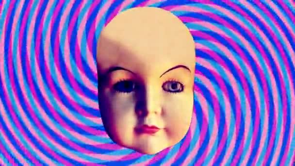 Puppenkopf mit animierter Mimik auf hypnotischem Hintergrund - Filmmaterial, Video