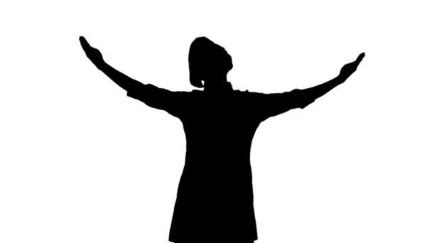 Black silhouette of cook girl raising hands and head up. - Filmagem, Vídeo