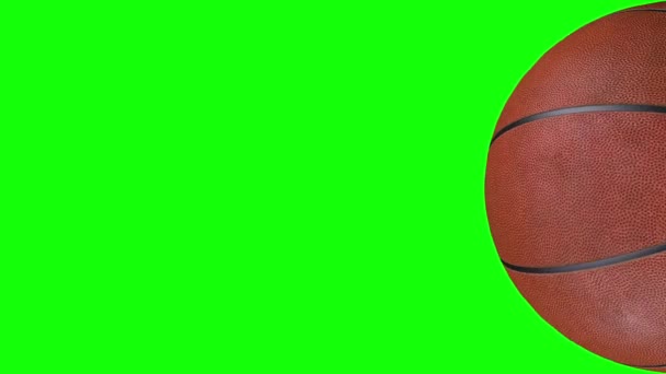 3D animation of textured basketball ball rotating in slow motion. - Video