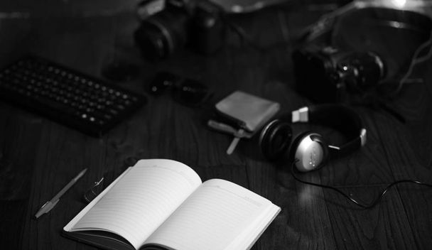 The photographer's desk, digital camera accessories and lense - Photo, Image