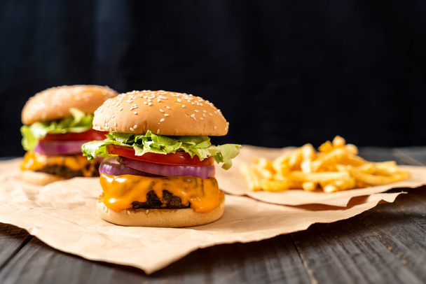 fresh tasty beef burger with cheese and french fries - Photo, image