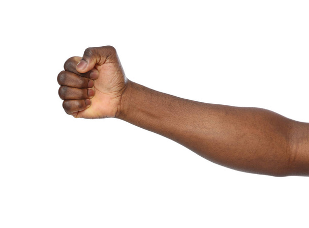 African-American man showing fist on white background, closeup - Φωτογραφία, εικόνα