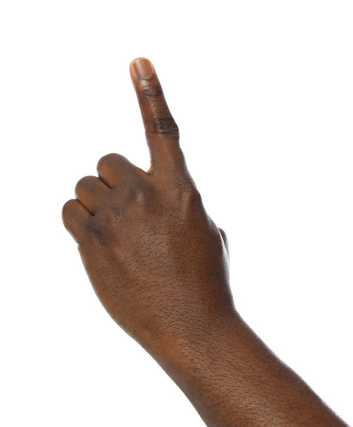 African-American man pointing at something on white background, closeup - Foto, Imagem