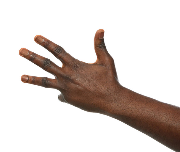 African-American man showing number FOUR on white background, closeup - Valokuva, kuva