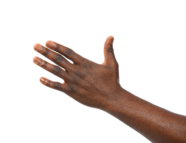 African-American man showing hand gesture on white background, closeup - Zdjęcie, obraz
