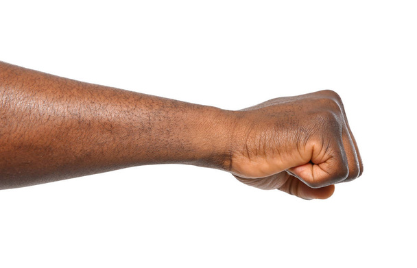 African-American man showing fist on white background, closeup - Foto, Imagem