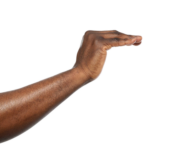 African-American man showing height on white background, closeup - Foto, Imagem