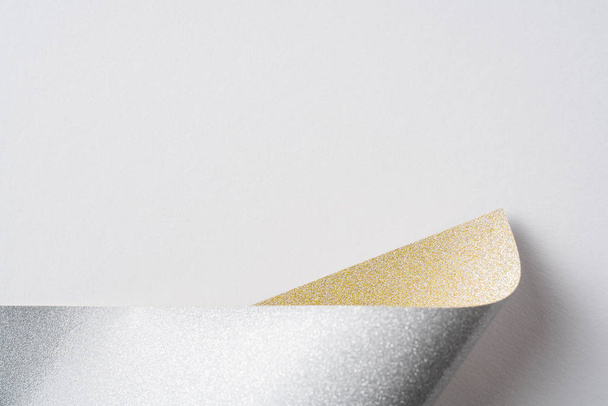 Design concept - silver and golden folded paper background for mockup - Foto, afbeelding