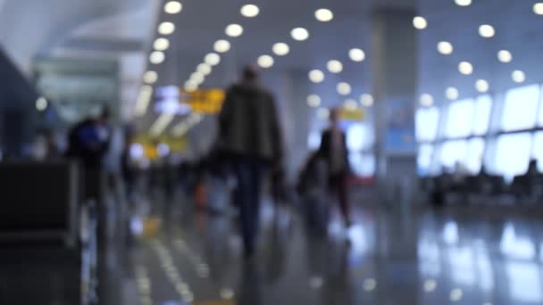 Airport. People in defocus walk with bags and suitcases. 4K Slow Mo - Footage, Video