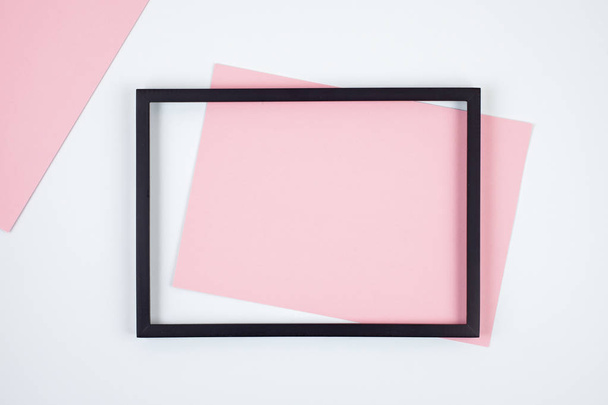Abstract pastel colored paper texture with empty frames  - Фото, изображение