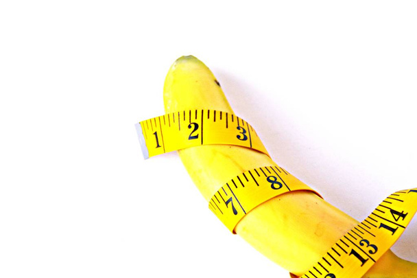 měření pásky a banánu blízko  - Fotografie, Obrázek