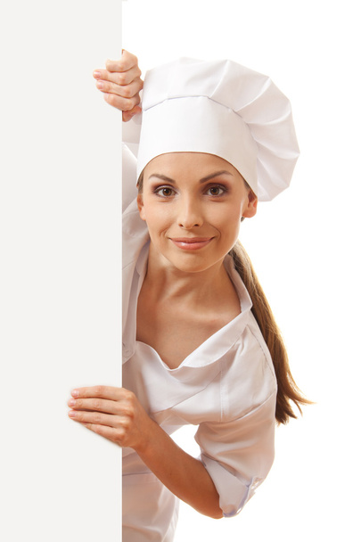 Woman chef, baker or cook holding white paper sign - Foto, Imagen