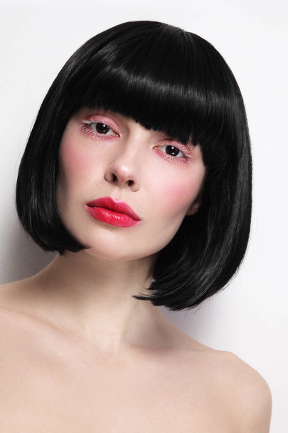 Young beautiful woman with fancy make-up and bob haircut - Photo, Image