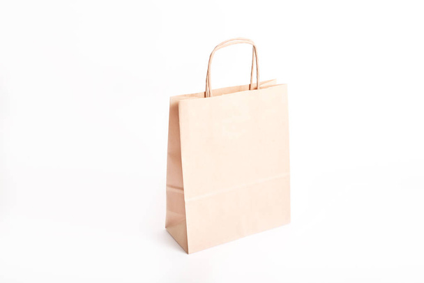 Paper bag on white background, isolated - Fotoğraf, Görsel