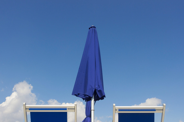 Deck chairs and sun umbrella - Photo, Image