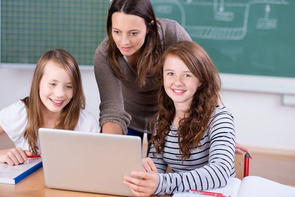Students with laptop - Фото, изображение