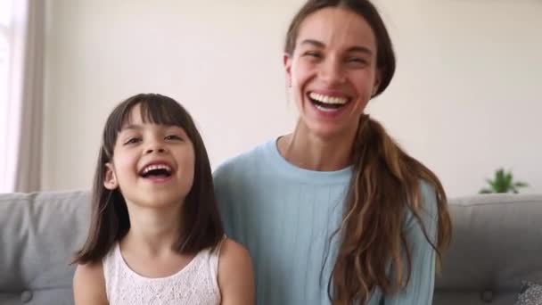 Happy mother and cute kid daughter make distant online call - Filmmaterial, Video