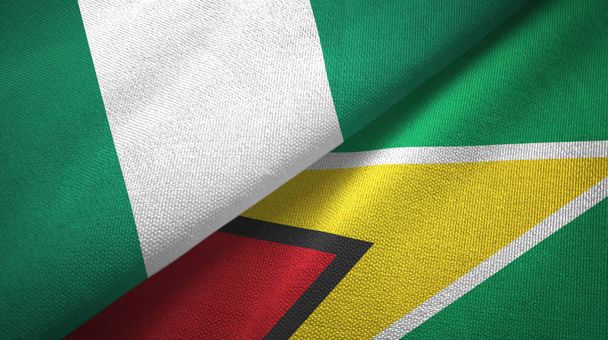 Nigeria and Guyana two flags textile cloth, fabric texture - Photo, Image