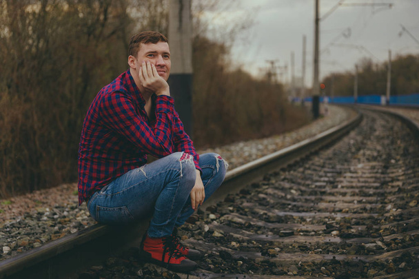 Trendy young man  on rails - Fotografie, Obrázek