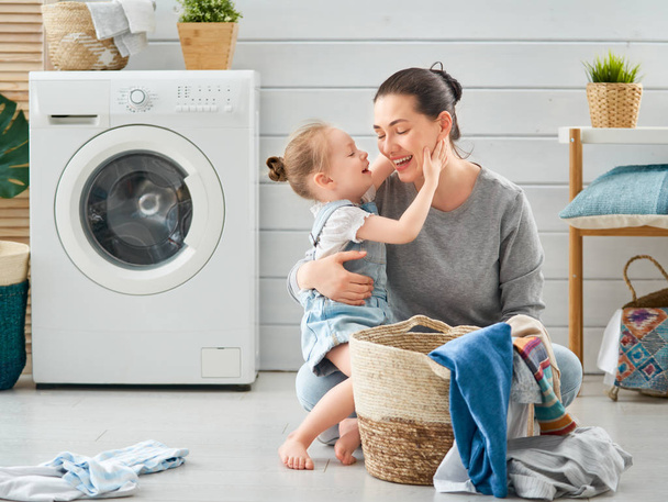 family doing laundry - Foto, Imagen