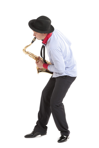 young man playing on saxophone - Foto, afbeelding