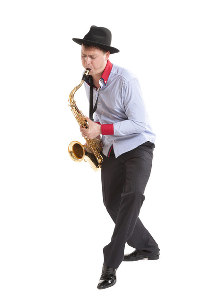 young man playing on saxophone - Photo, Image