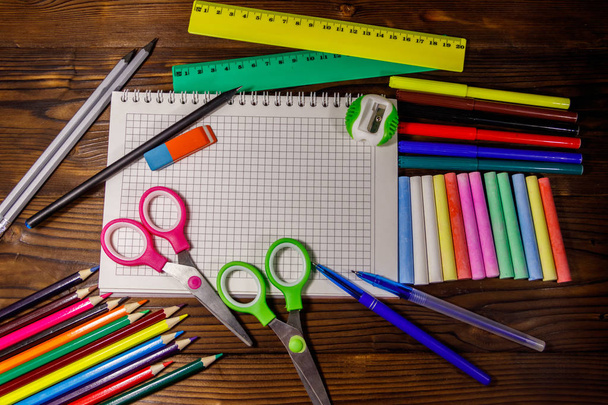 Set of school stationery supplies on wooden desk. Back to school - Foto, immagini