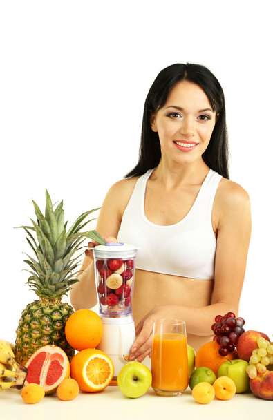 Chica con frutas frescas aisladas en blanco
 - Foto, Imagen
