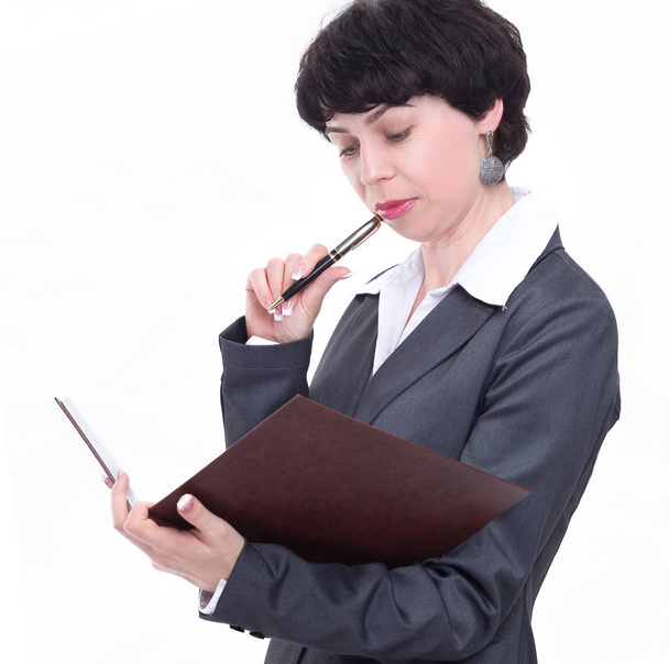 business woman carefully reading a business document - Foto, Bild