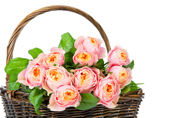 Pink roses in the basket - Фото, изображение