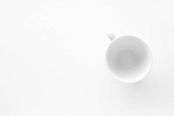 Empty cup and saucer mockup on white background, flatlay - Zdjęcie, obraz