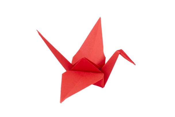 Red origami crane isolated on the white background - Foto, Imagem