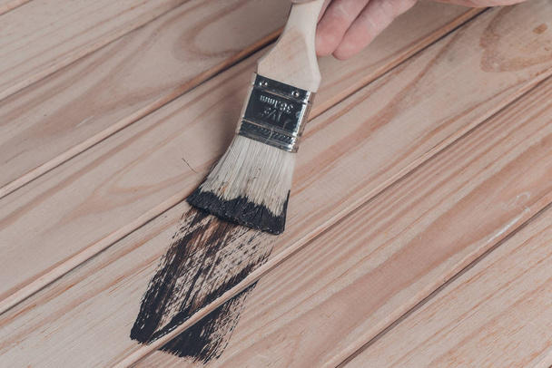 Wood texture and paintbrush / housework. - Photo, image
