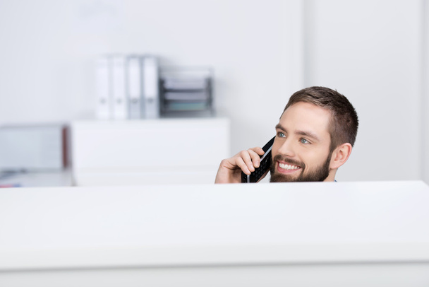 Businessman Looking Away While On Call - Photo, image