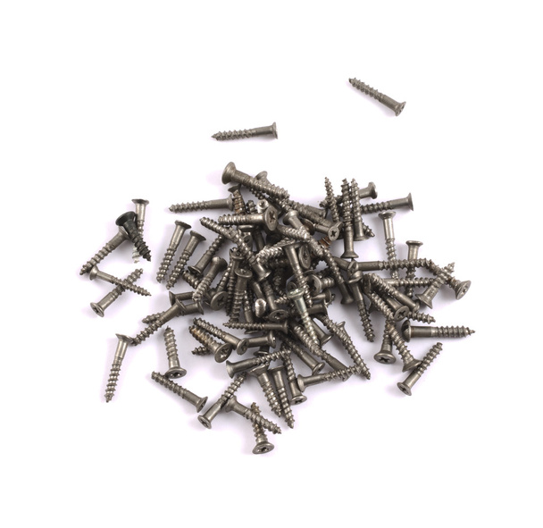 Pile of metal screws isolated - Fotografie, Obrázek