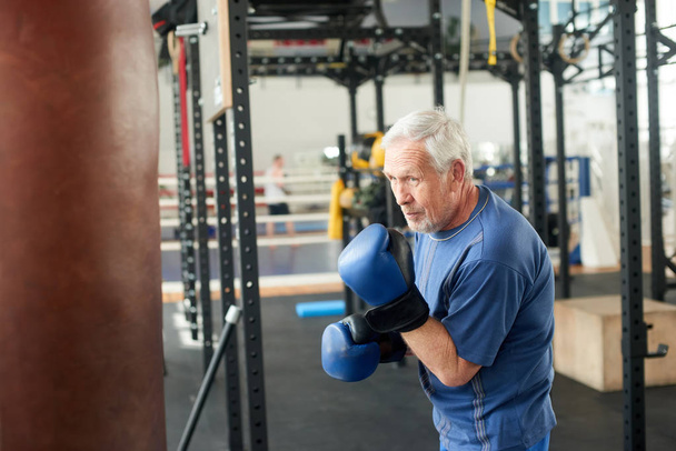 Senior male boxer ready to fight. - Φωτογραφία, εικόνα