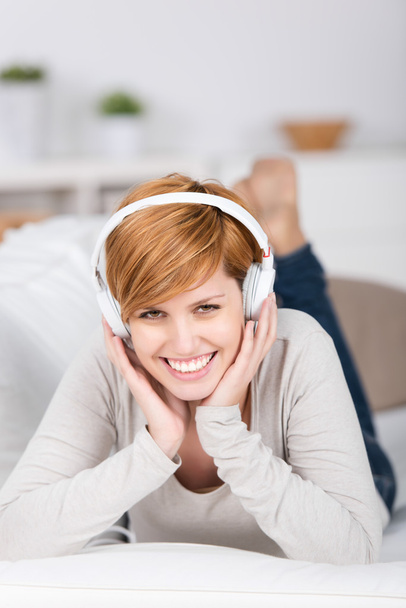 Happy Woman Enjoying Music Though Headphones - Foto, imagen